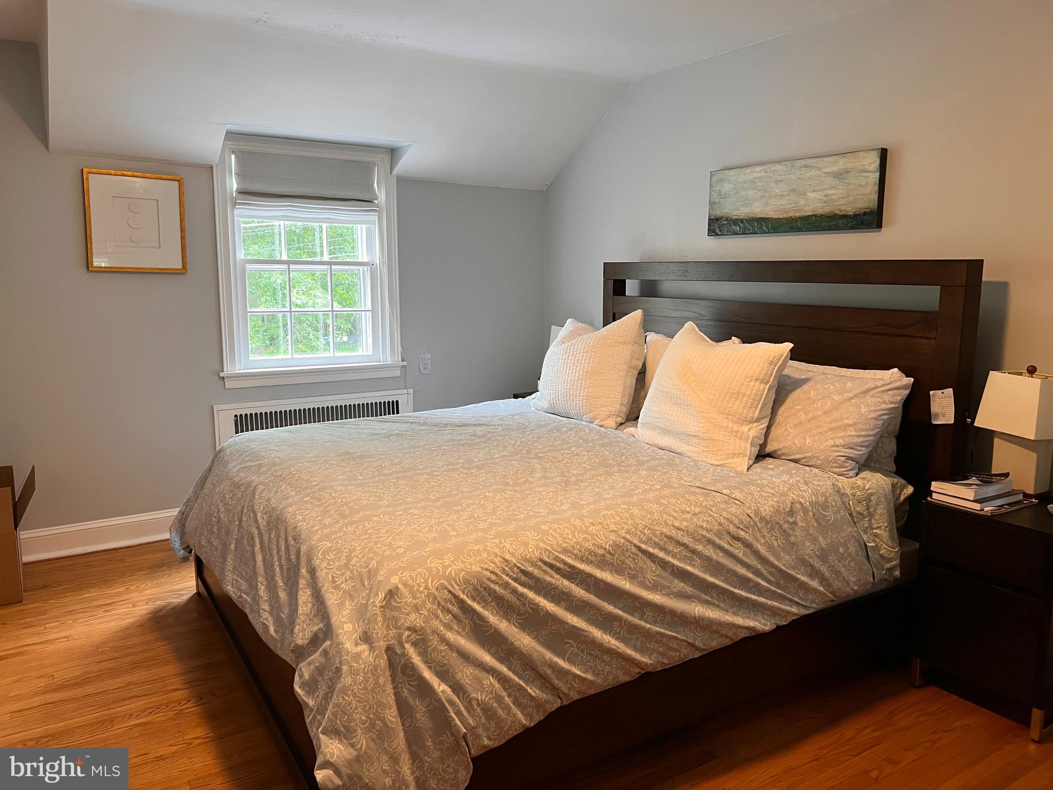 112 Hilltop Road Philadelphia, PA 19118 - Photo 9 of 13 a bedroom with a bed and window