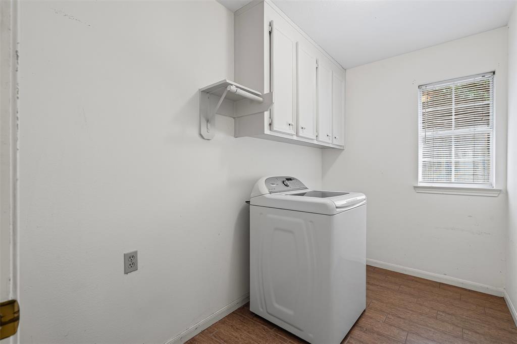 7948 Morning Lane Fort Worth, TX 76123 - Photo 15 of 32 a utility room with sink dryer and washer