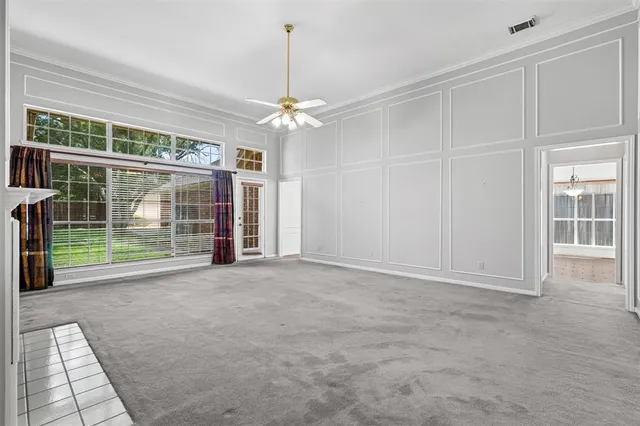 a view of empty room with windows