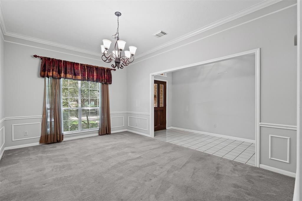 7948 Morning Lane Fort Worth, TX 76123 - Photo 8 of 32 a view of an empty room with a window