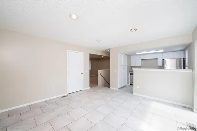 a view of a kitchen with a sink