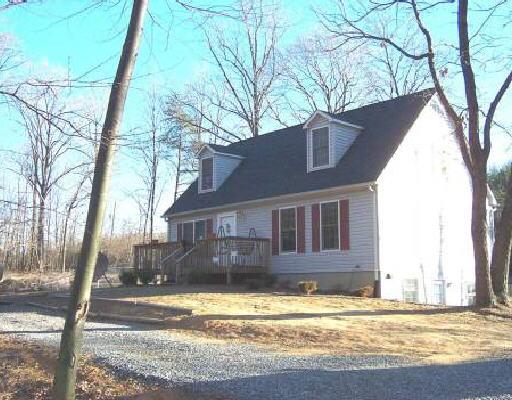 1256 Annie Bell Road Blue Ridge, VA 24064 - Photo 1 of 1 a front view of a house with a yard
