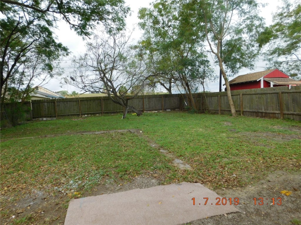 2625 Riggan Street Corpus Christi, TX 78404 - Photo 7 of 7 a view of a backyard with a small cabin