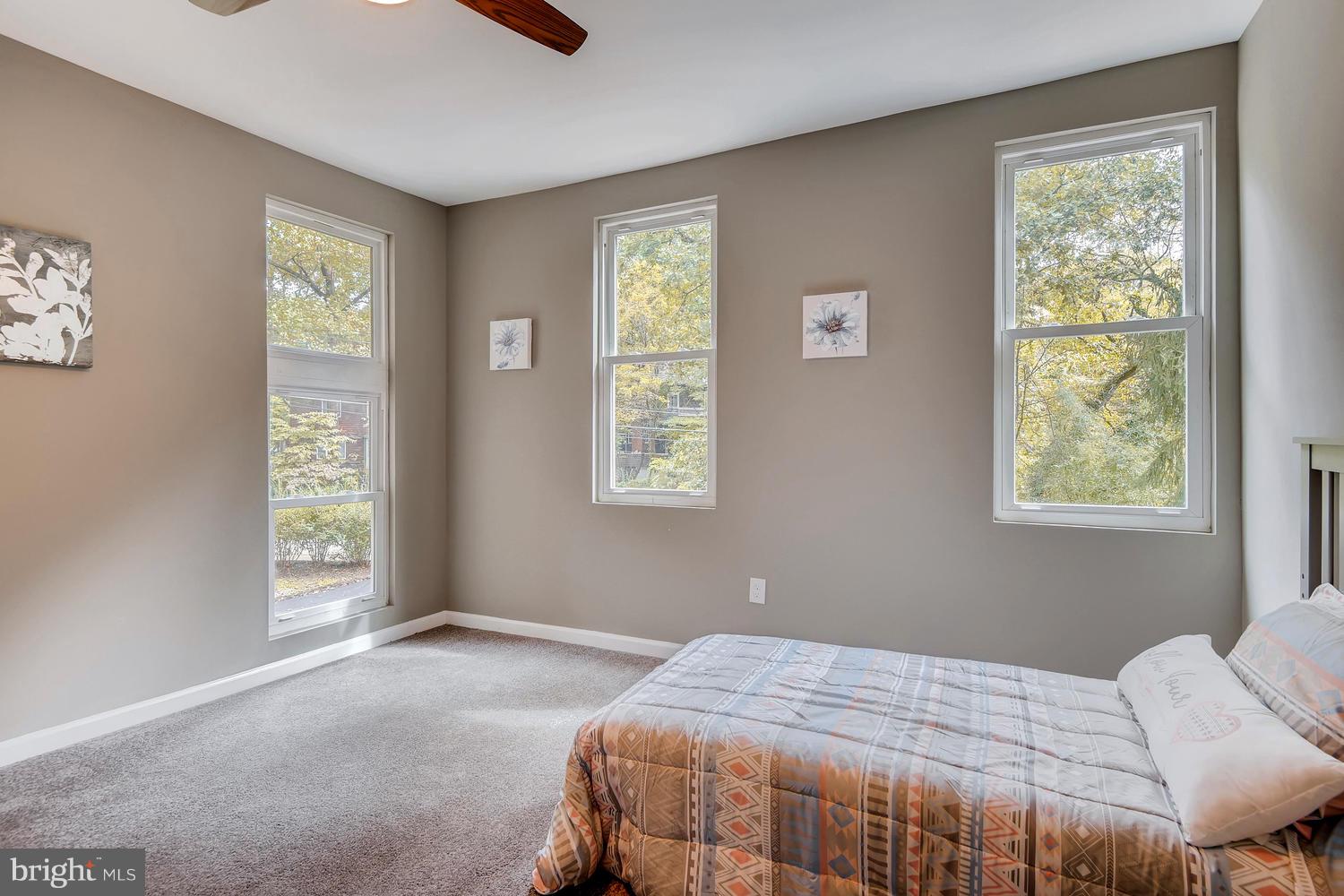 2612 Talbot Road Baltimore, MD 21216 - Photo 23 of 33 a bedroom with a bed and a window