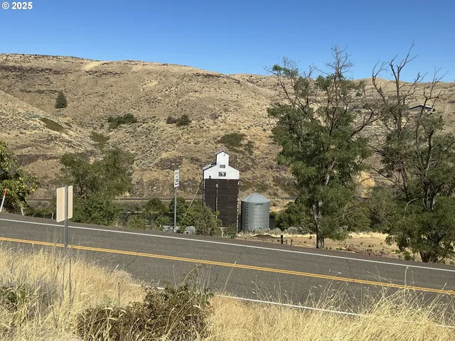 a view of a building with a mountain