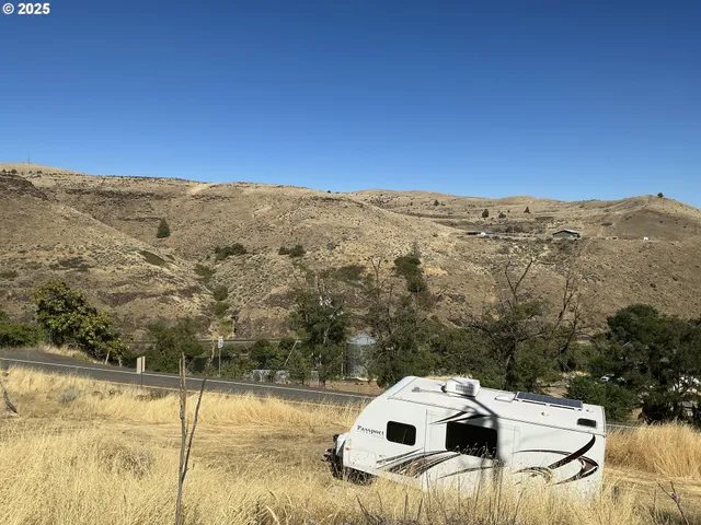 a view of a terrace with a lake view