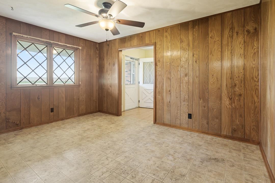 5618 North Armour Road Stillman Valley, IL 61084 - Photo 10 of 29 an empty room with windows and fan
