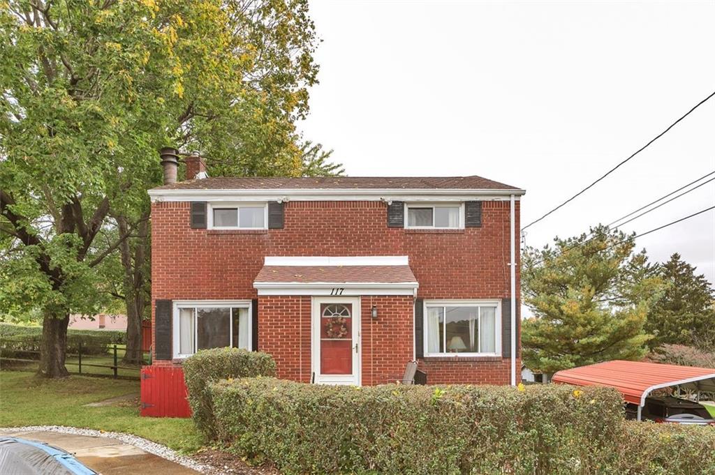 117 Diebold Road McKees Rocks, PA 15136 - Photo 2 of 22 a front view of a house with a yard