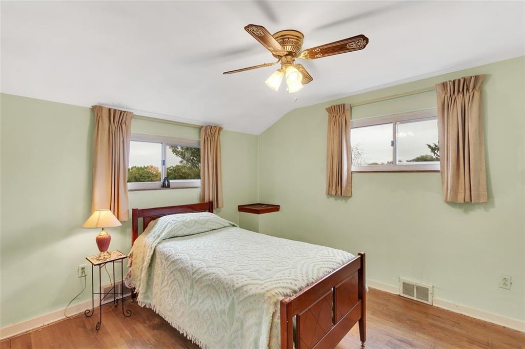 117 Diebold Road McKees Rocks, PA 15136 - Photo 16 of 22 a bedroom with a bed and a window