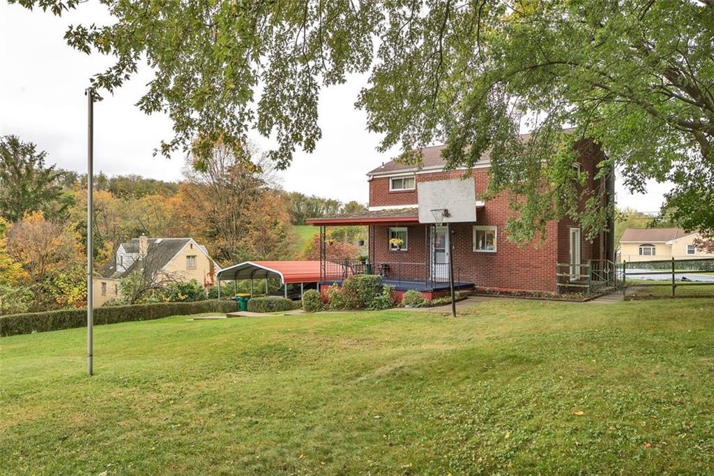 117 Diebold Road McKees Rocks, PA 15136 - Photo 5 of 22 a view of a house with a yard