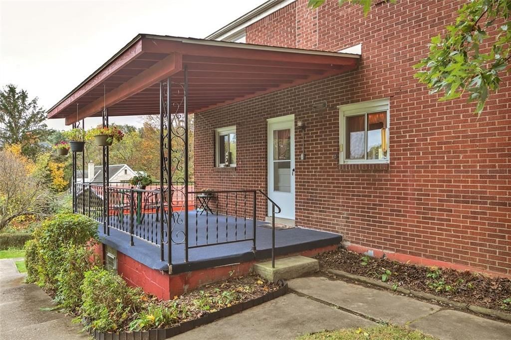 117 Diebold Road McKees Rocks, PA 15136 - Photo 7 of 22 a view of a house with a yard