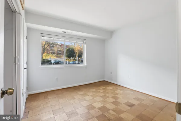 a view of an empty walk in closet