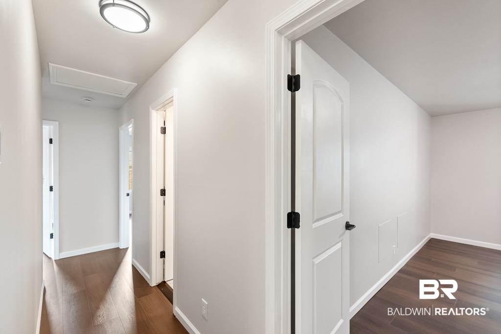 554 Stuart Street Daphne, AL 36526 - Photo 24 of 49 Hallway with dark hardwood / wood-style floors