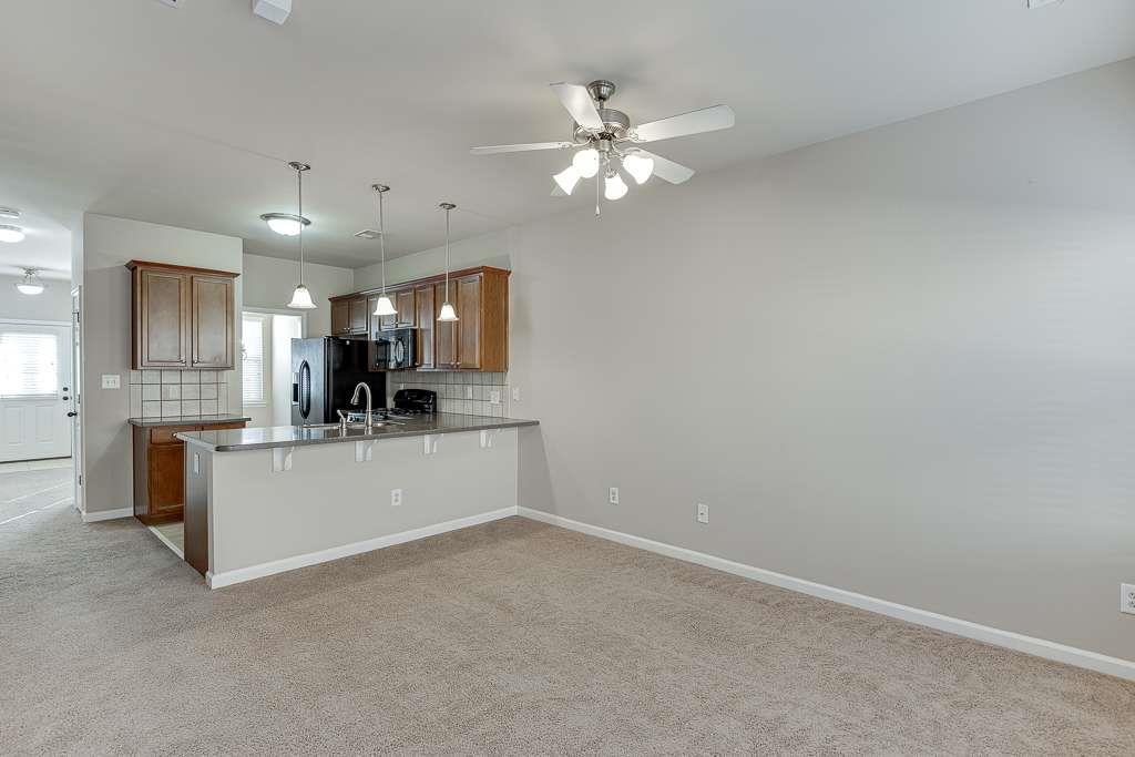1043 Nightfall Court Northwest Suwanee, GA 30024 - Photo 14 of 39 a view of kitchen with sink