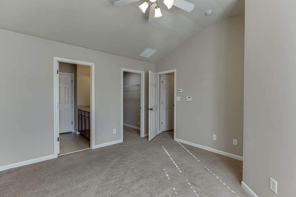1043 Nightfall Court Northwest Suwanee, GA 30024 - Photo 24 of 39 an empty room with a bathroom