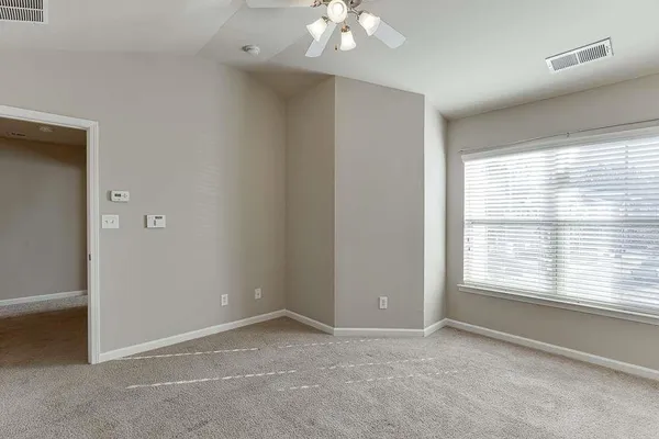 a bathroom with a sink double vanity and a mirror
