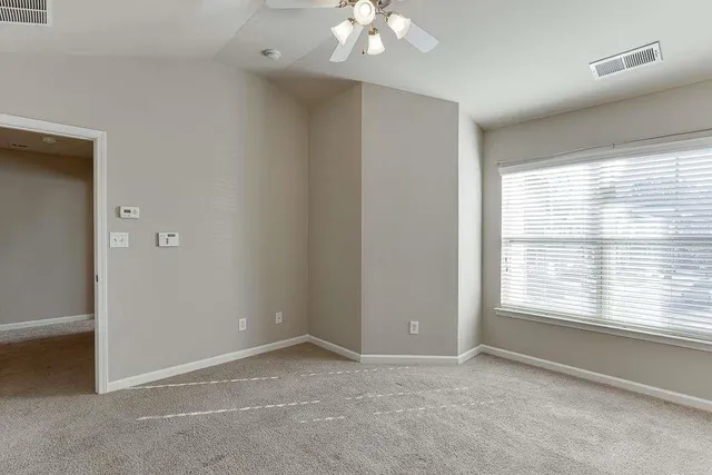 a bathroom with a sink double vanity and a mirror