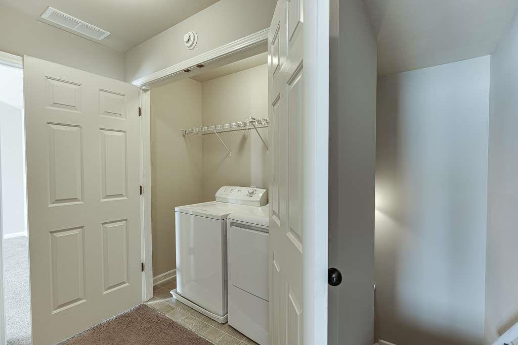 1043 Nightfall Court Northwest Suwanee, GA 30024 - Photo 30 of 39 a bathroom with a shower