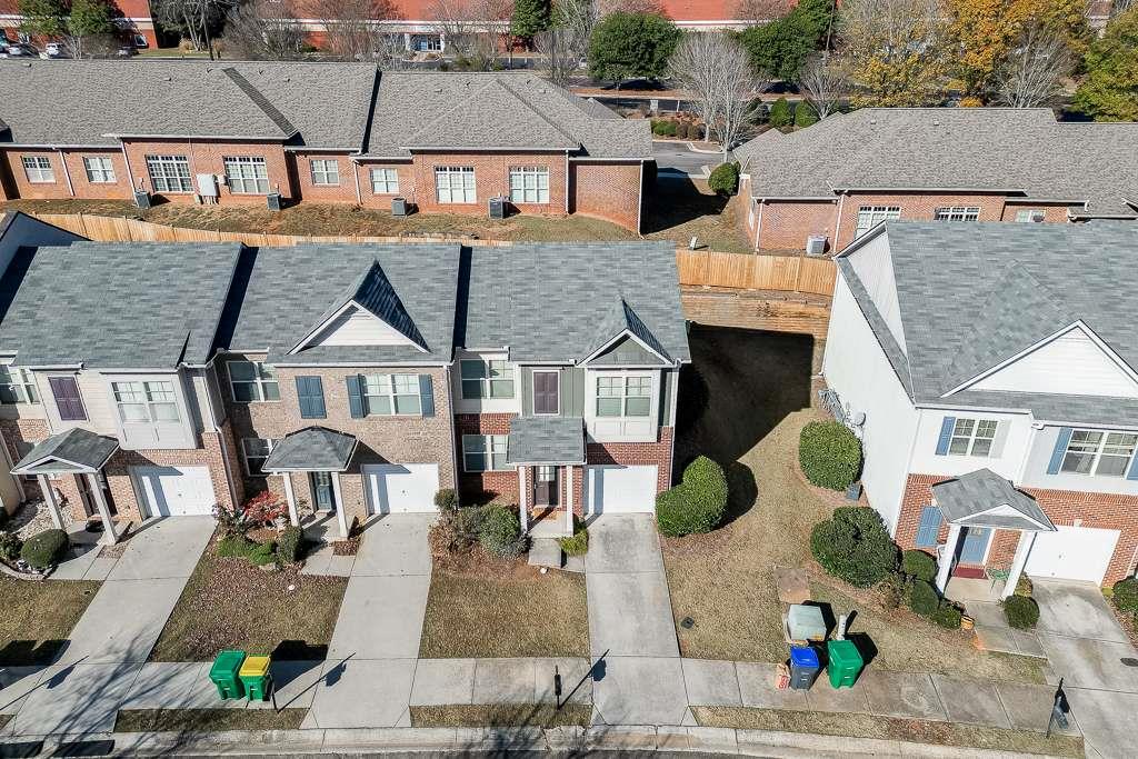 1043 Nightfall Court Northwest Suwanee, GA 30024 - Photo 36 of 39 an aerial view of multiple houses