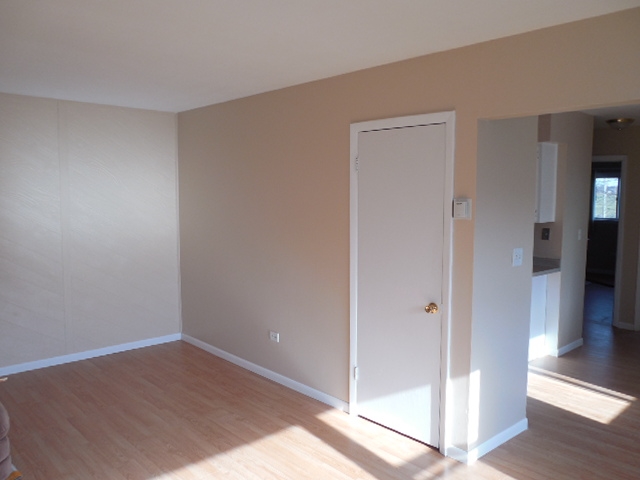 239 Northway Park Road, Unit 12 Machesney Park, IL 61115 - Photo 3 of 18 a view of an empty room