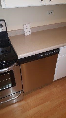 239 Northway Park Road, Unit 12 Machesney Park, IL 61115 - Photo 8 of 18 a close view of closet