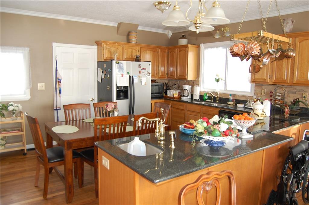 602 Hells Kitchen Road Polk, PA 16342 - Photo 7 of 22 Updated Kitchen Area with Newer Granite Counter Tops/cabinets.