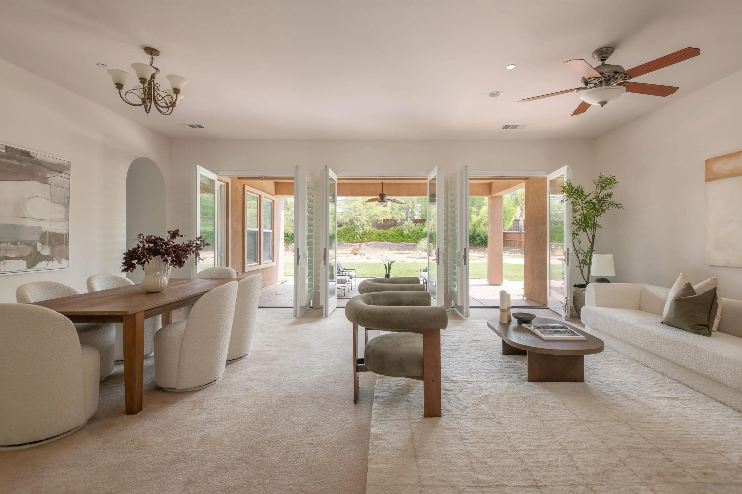 14220 Pebble Beach Way Valley Center, CA 92082 - Photo 14 of 48 a living room with furniture and a large window
