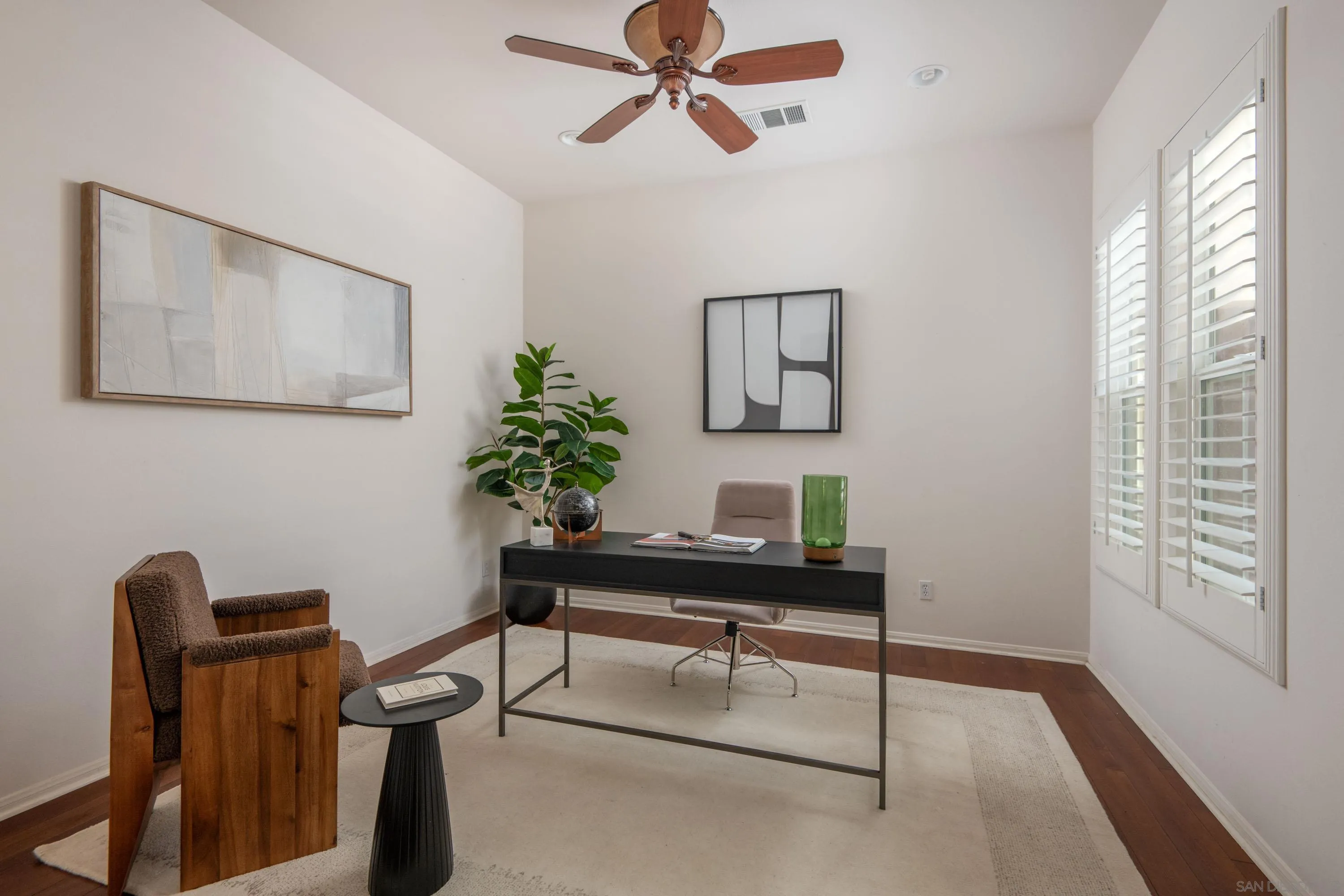 14220 Pebble Beach Way Valley Center, CA 92082 - Photo 18 of 48 a view of a workspace with furniture and a window