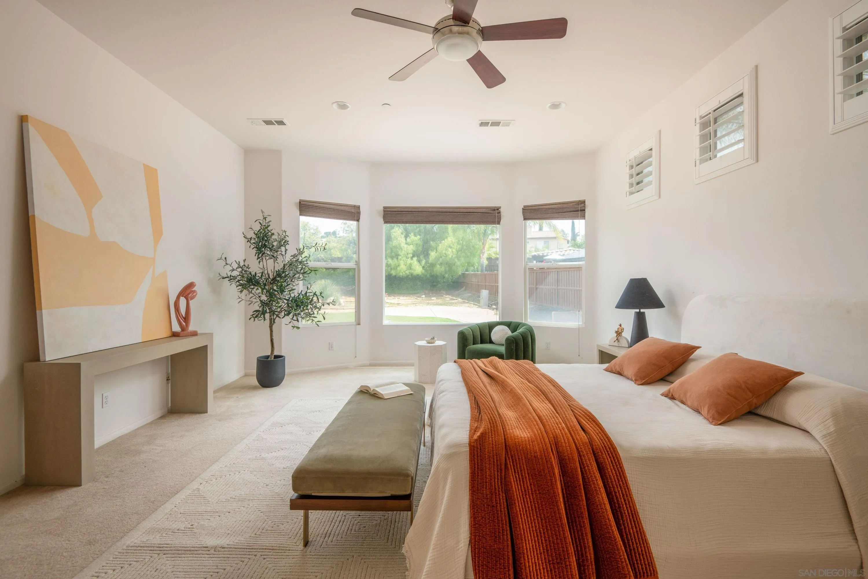 14220 Pebble Beach Way Valley Center, CA 92082 - Photo 20 of 48 a bedroom with a bed potted plant with the window