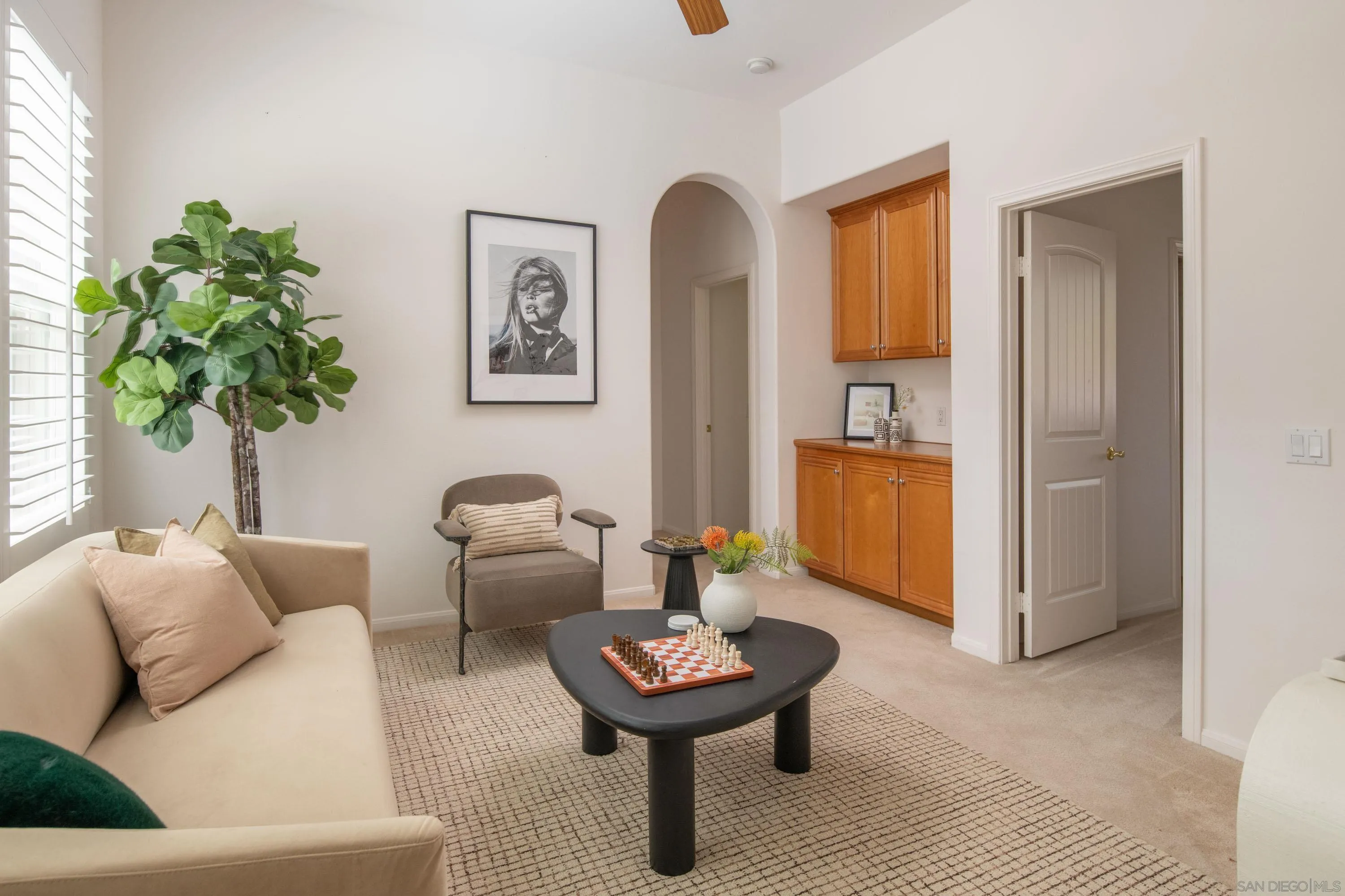 14220 Pebble Beach Way Valley Center, CA 92082 - Photo 26 of 48 a living room with furniture a window and a potted plant