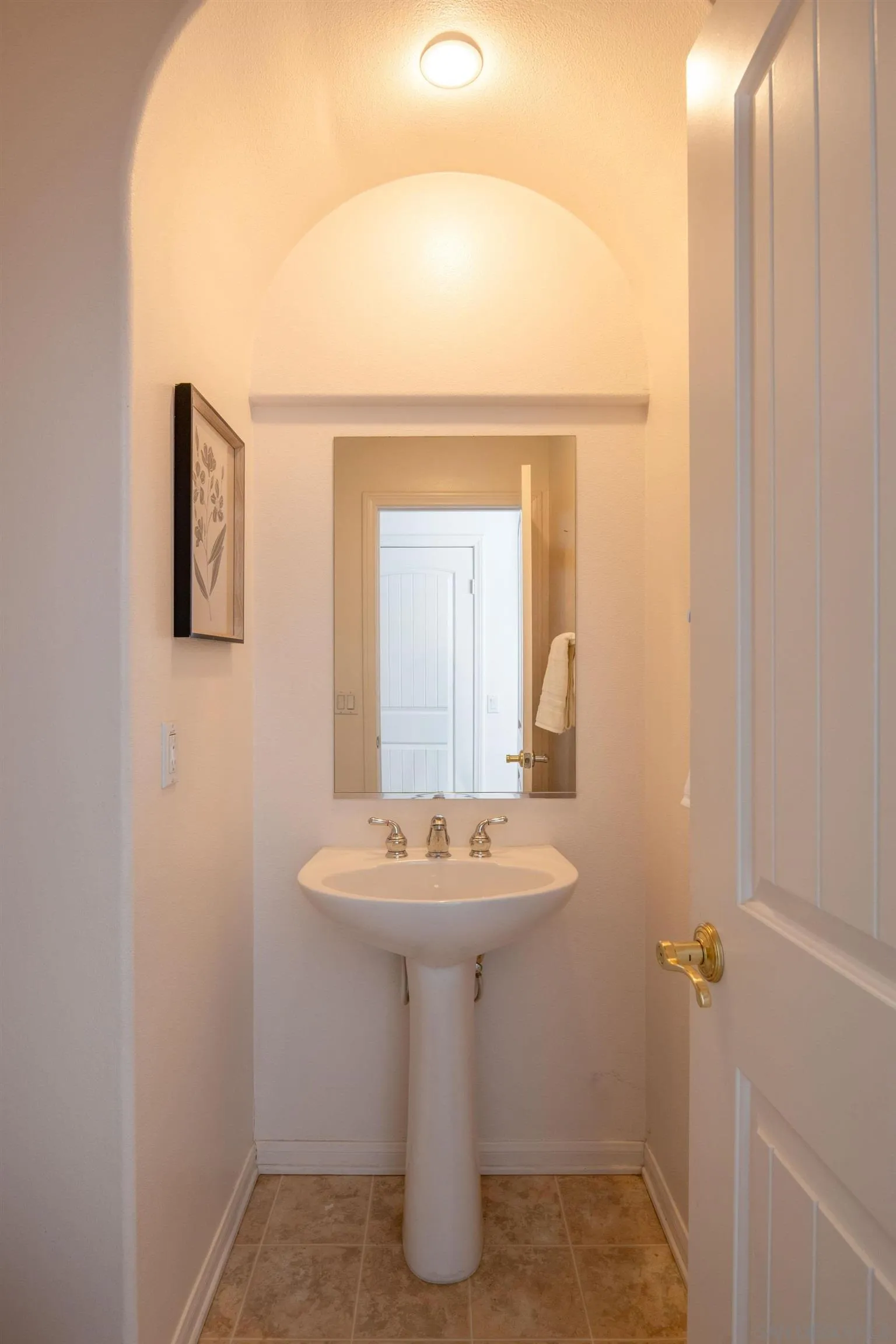 14220 Pebble Beach Way Valley Center, CA 92082 - Photo 27 of 48 a bathroom with a sink and a mirror