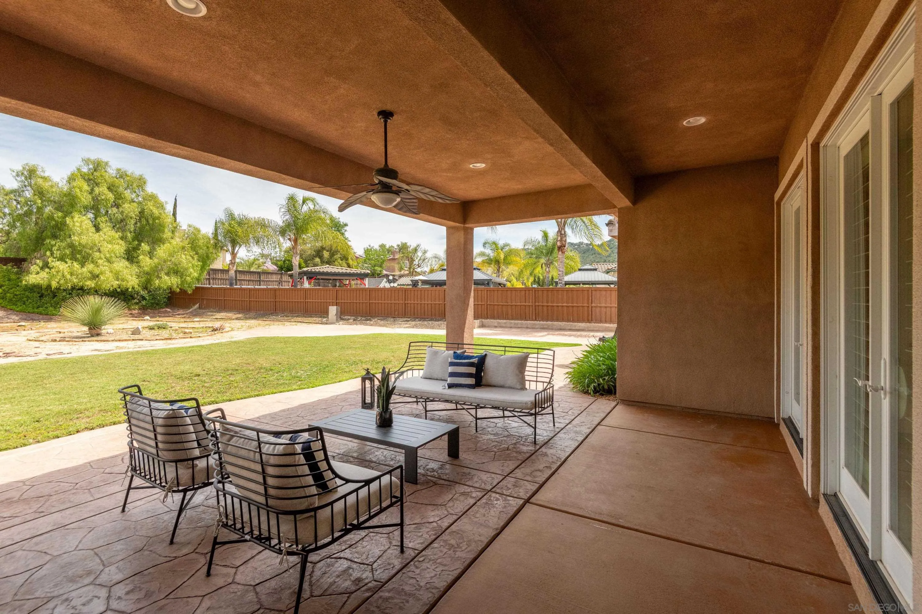 14220 Pebble Beach Way Valley Center, CA 92082 - Photo 31 of 48 a view of swimming pool with outdoor seating
