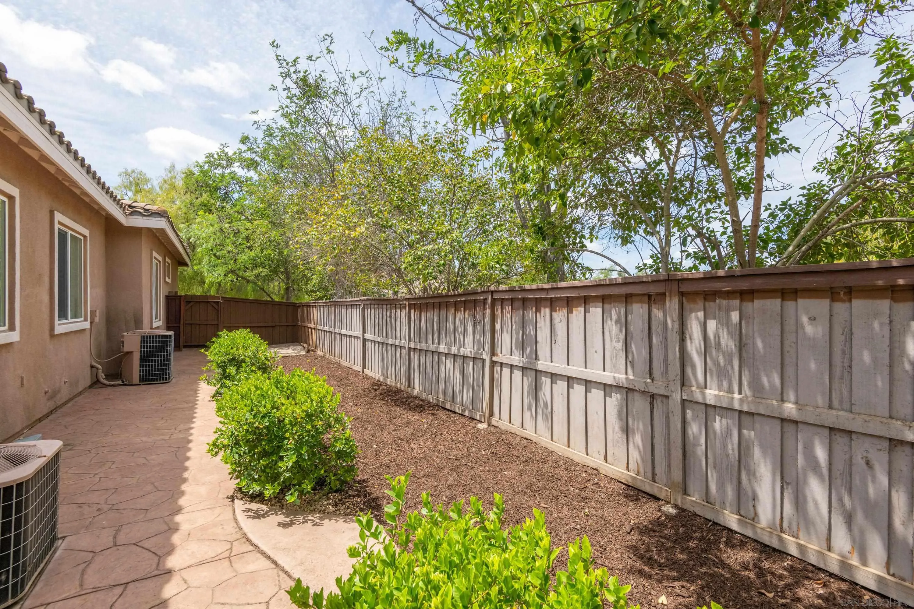 14220 Pebble Beach Way Valley Center, CA 92082 - Photo 33 of 48 a view of backyard with green space