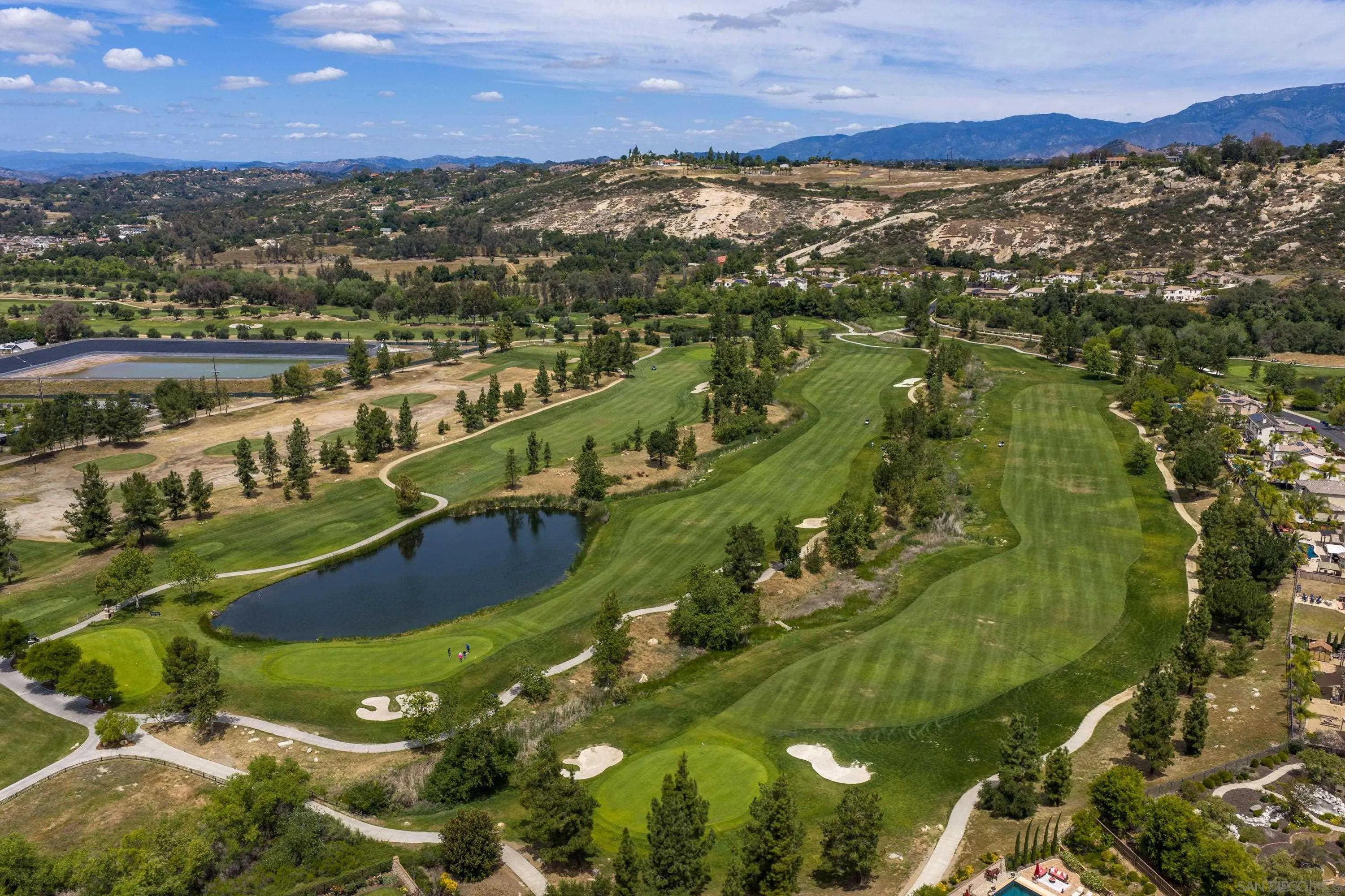 14220 Pebble Beach Way Valley Center, CA 92082 - Photo 42 of 48 a view of a city with mountains in front of it