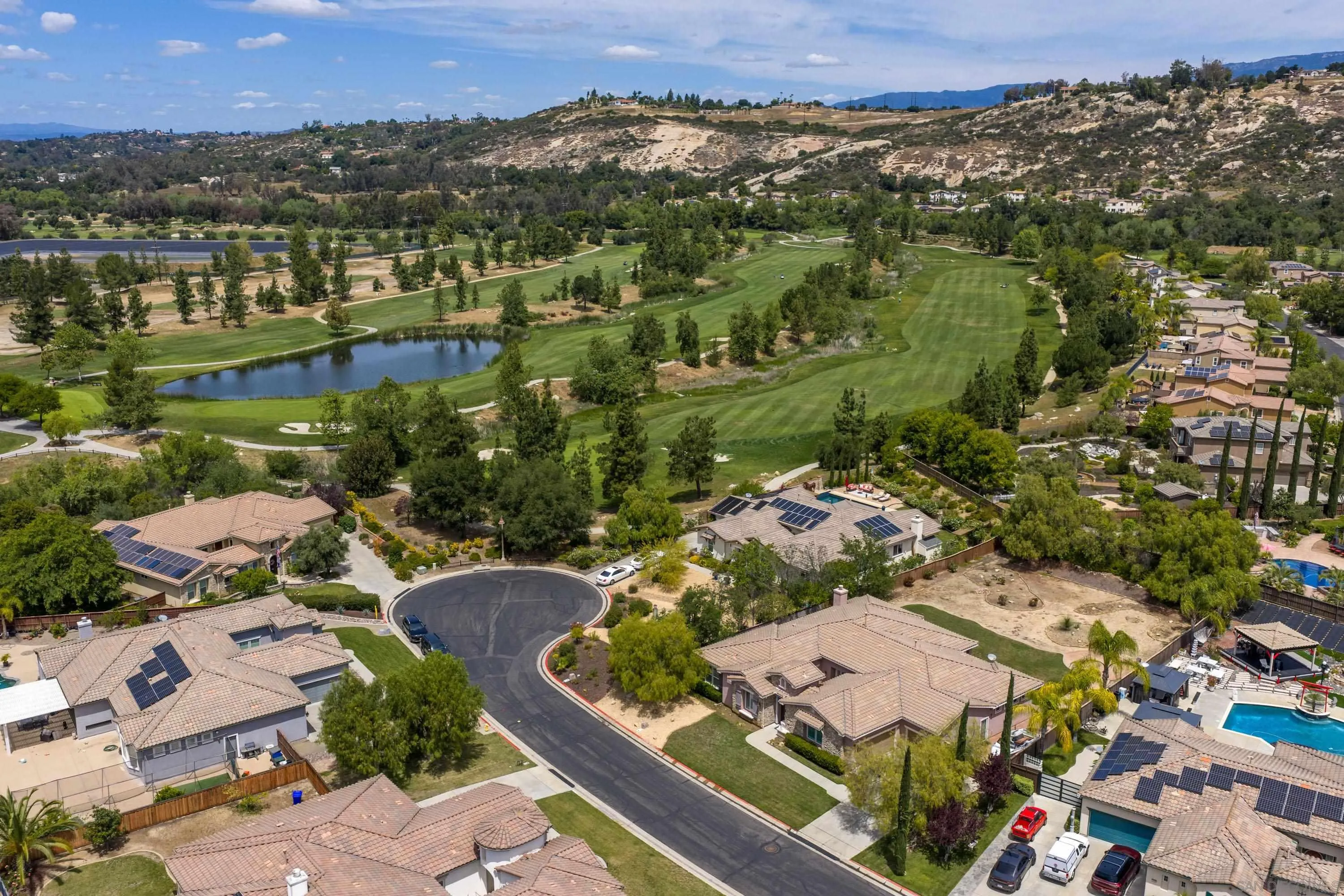 14220 Pebble Beach Way Valley Center, CA 92082 - Photo 44 of 48 an aerial view of residential houses with outdoor space and river