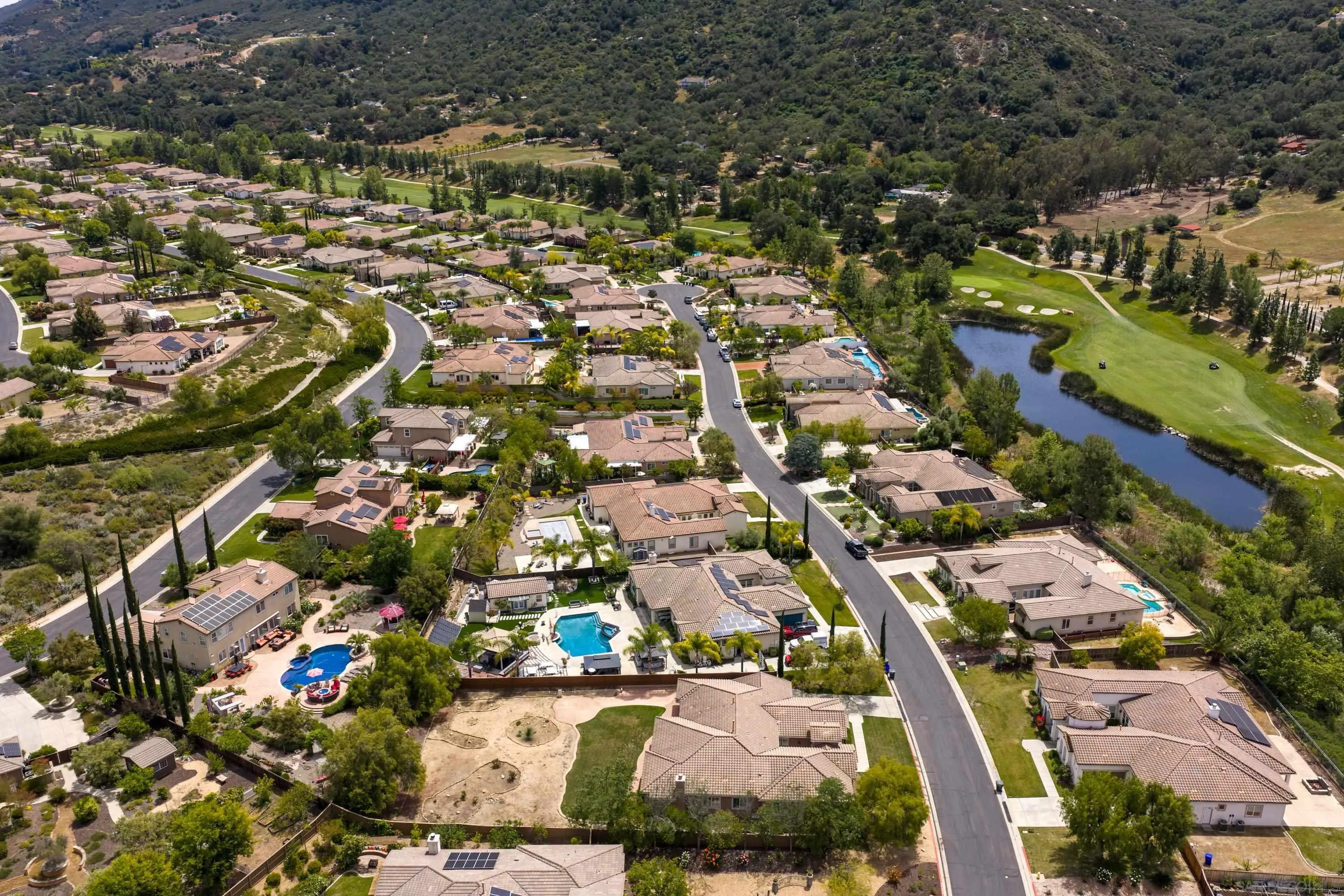 14220 Pebble Beach Way Valley Center, CA 92082 - Photo 46 of 48 an aerial view of residential houses with outdoor space