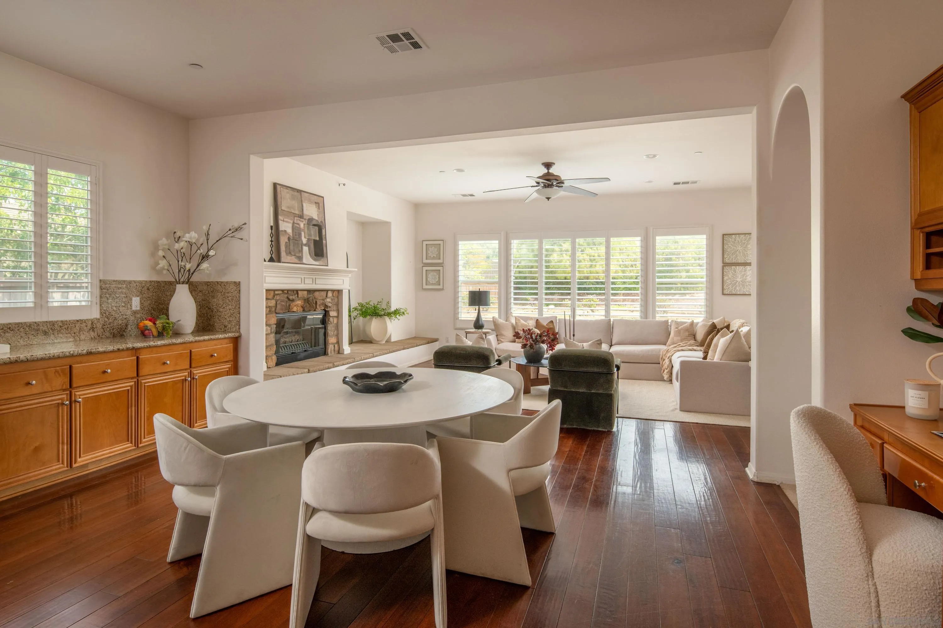14220 Pebble Beach Way Valley Center, CA 92082 - Photo 5 of 48 a view of a dining room with furniture window and wooden floor