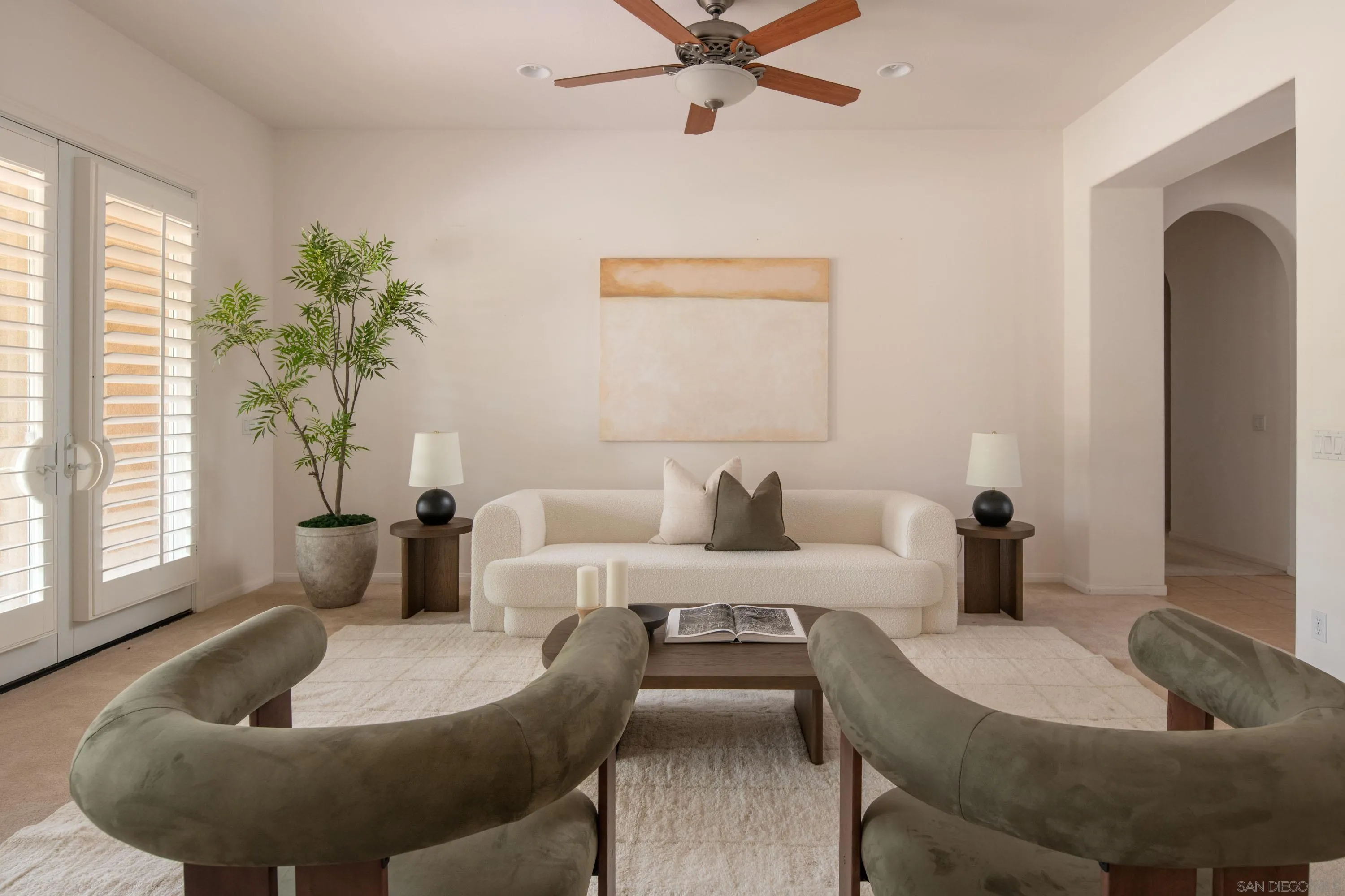 14220 Pebble Beach Way Valley Center, CA 92082 - Photo 10 of 48 a living room with furniture and a potted plant