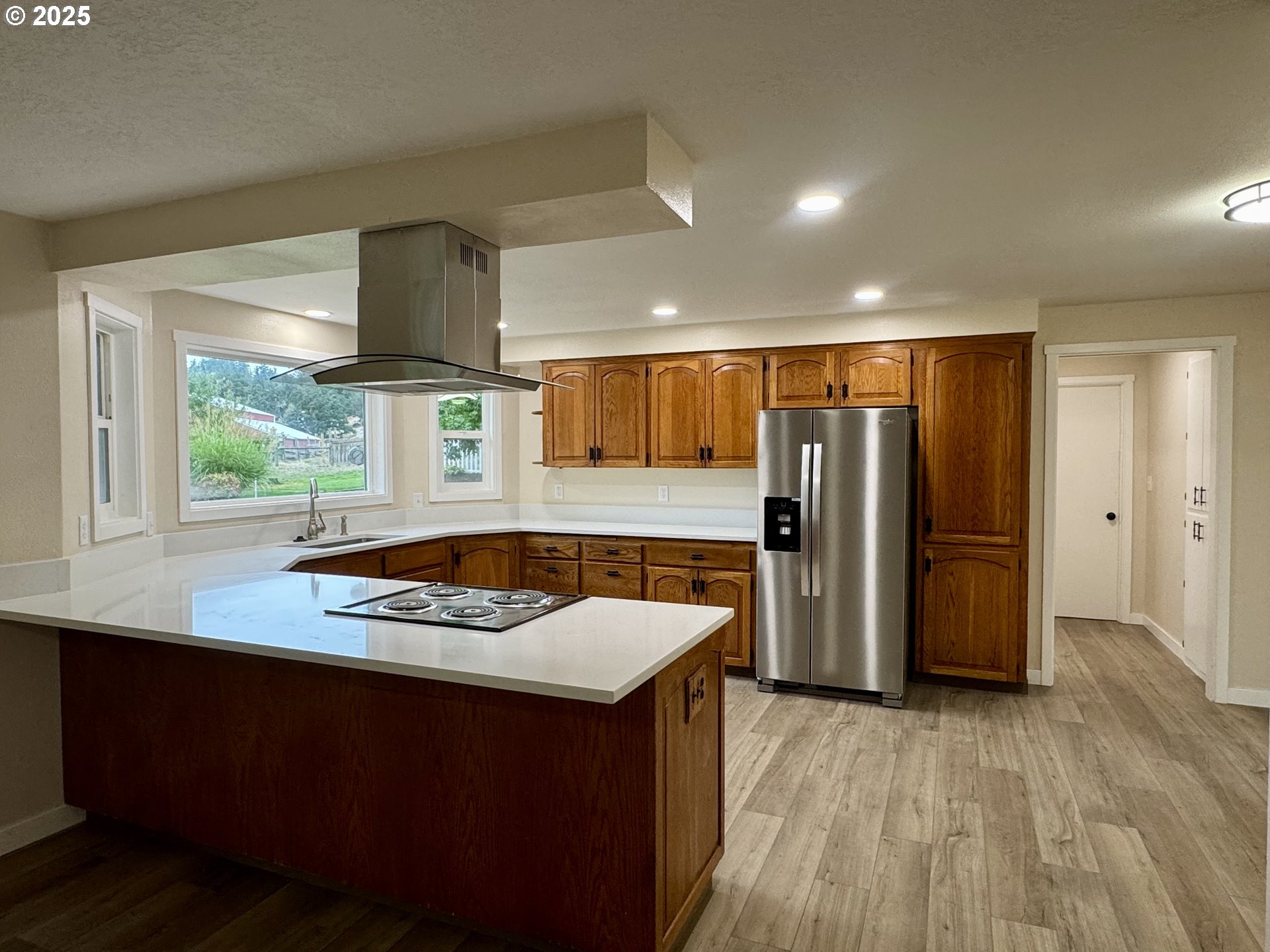 35929 Enterprise Road Creswell, OR 97426 - Photo 24 of 48 a kitchen with stainless steel appliances granite countertop a refrigerator a sink and a stove