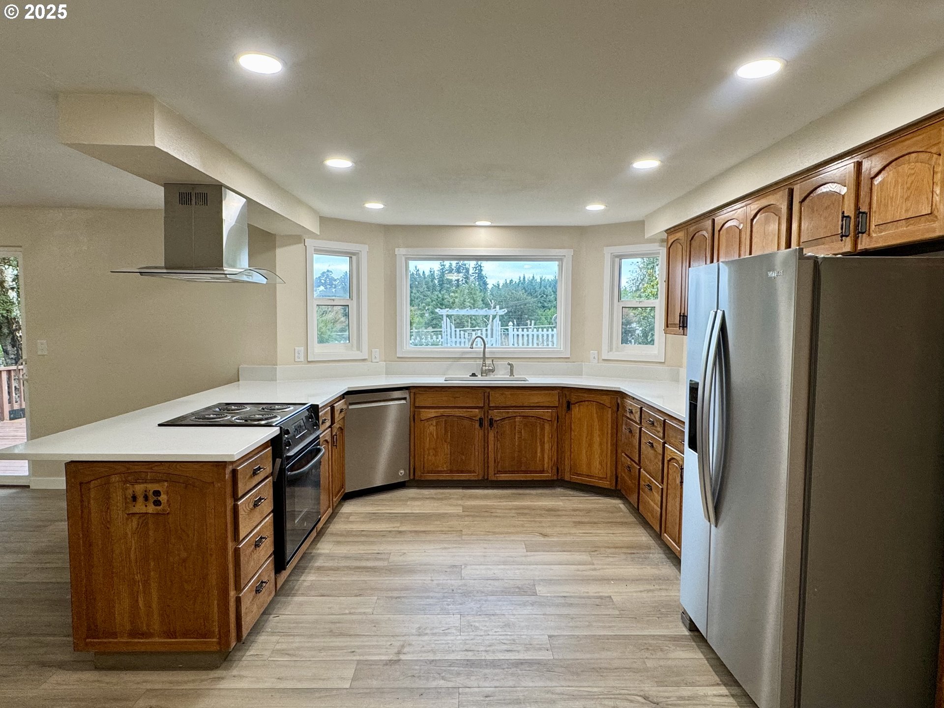 35929 Enterprise Road Creswell, OR 97426 - Photo 26 of 48 a kitchen with a stove a refrigerator and a sink