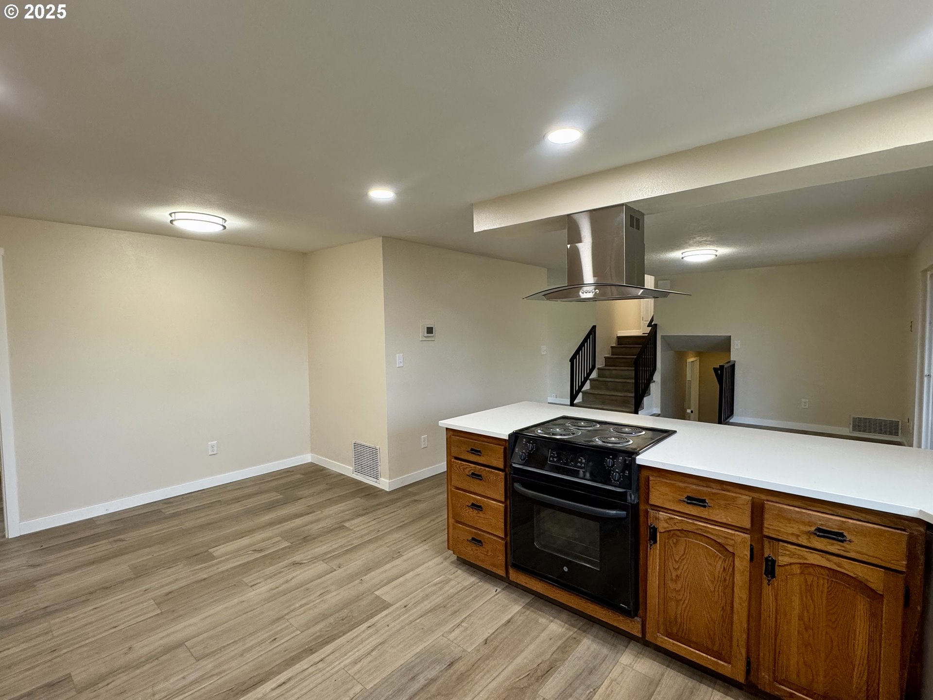35929 Enterprise Road Creswell, OR 97426 - Photo 29 of 48 a kitchen with a stove and wooden floor