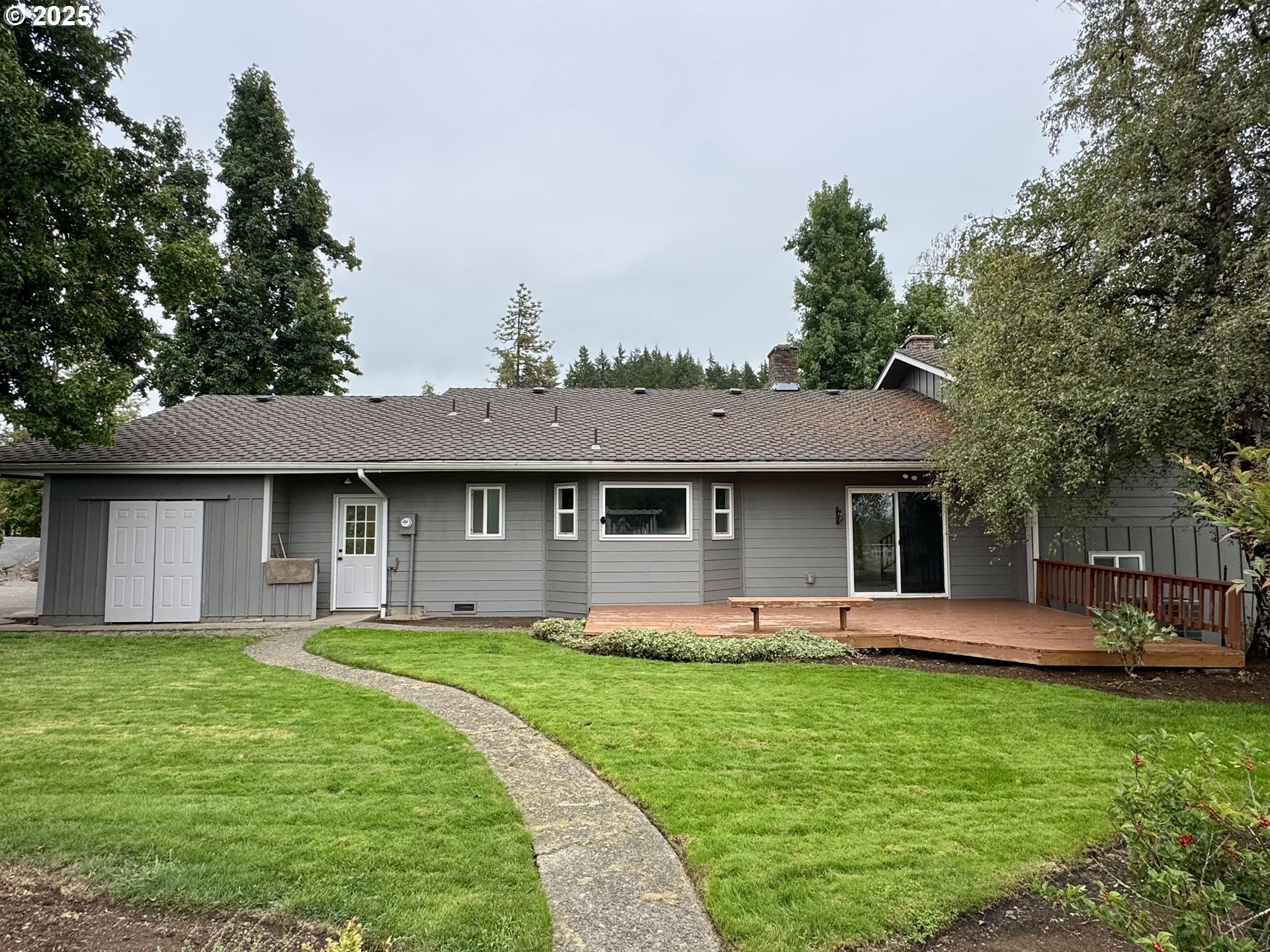 35929 Enterprise Road Creswell, OR 97426 - Photo 6 of 48 a front view of house with a garden and patio