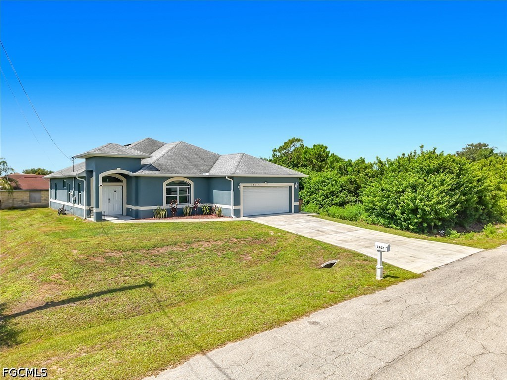 3907 11th Street Southwest Lehigh Acres, FL 33976 - Photo 1 of 43