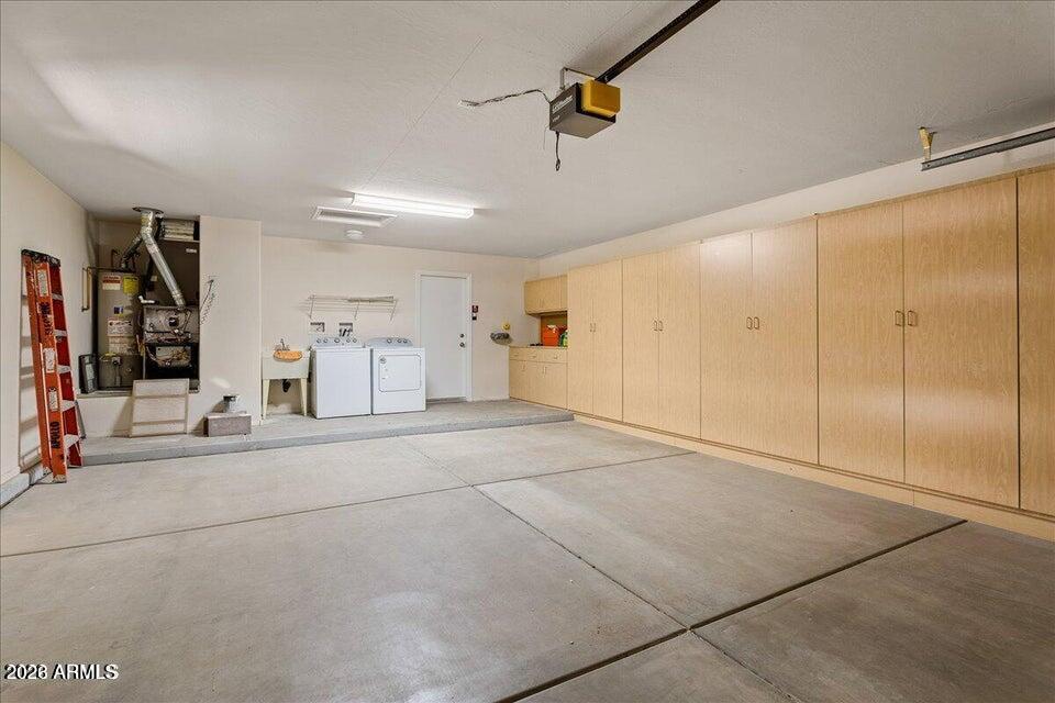 15066 West Cactus Ridge Way Surprise, AZ 85374 - Photo 3 of 30 2 car garage w cabinets 15066 W Cactus R
