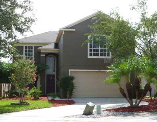1615 Red Ruffle Court Gotha, FL 34734 - Photo 1 of 1 a view of a house with a yard