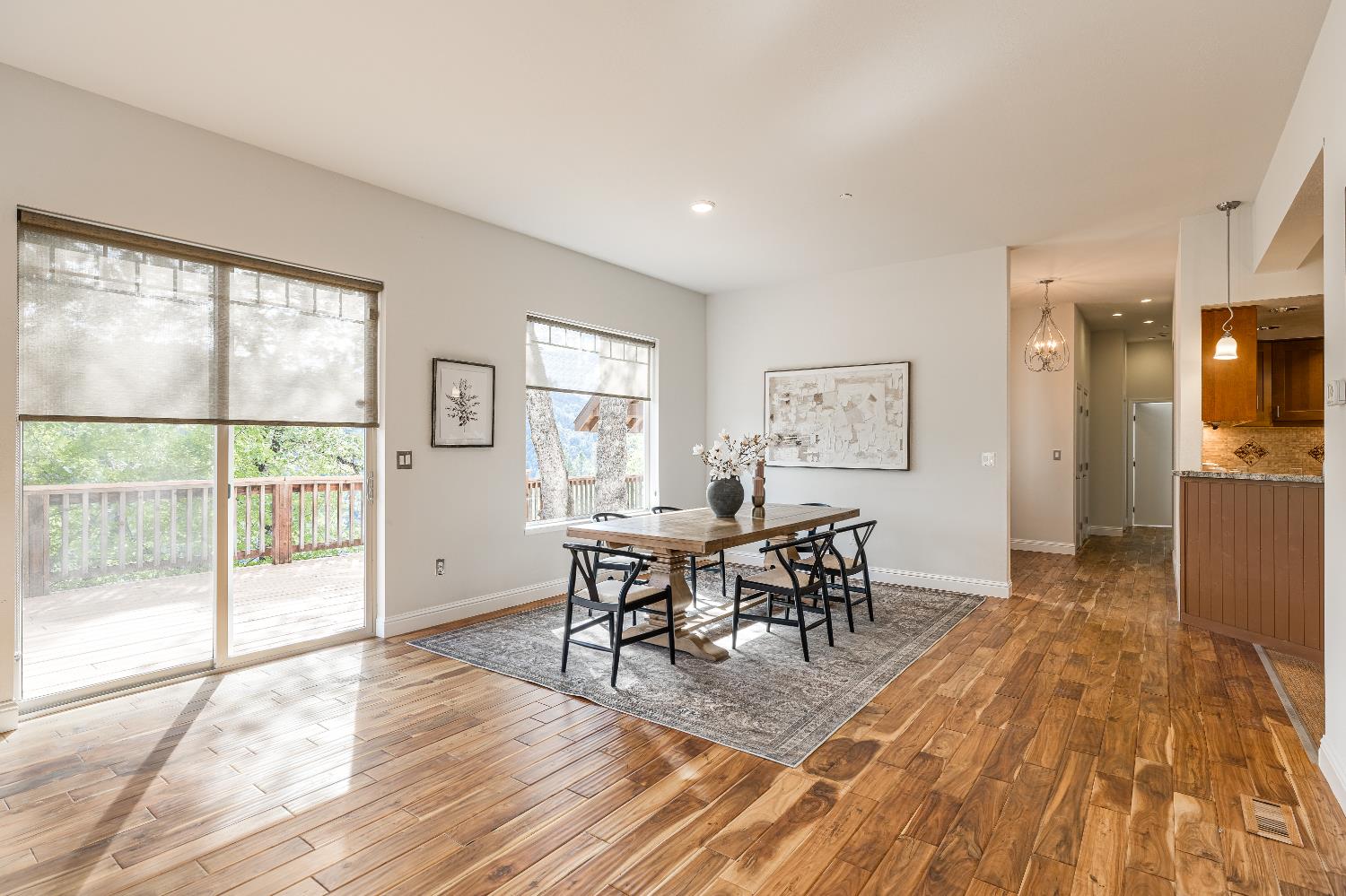2213 Old Toll Road Placerville, CA 95667 - Photo 12 of 77 a view of a dining room with furniture and wooden floor