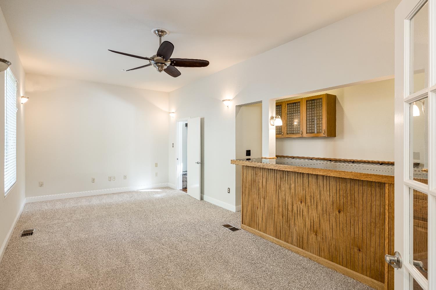 2213 Old Toll Road Placerville, CA 95667 - Photo 14 of 77 a view of a livingroom with a ceiling fan & a window