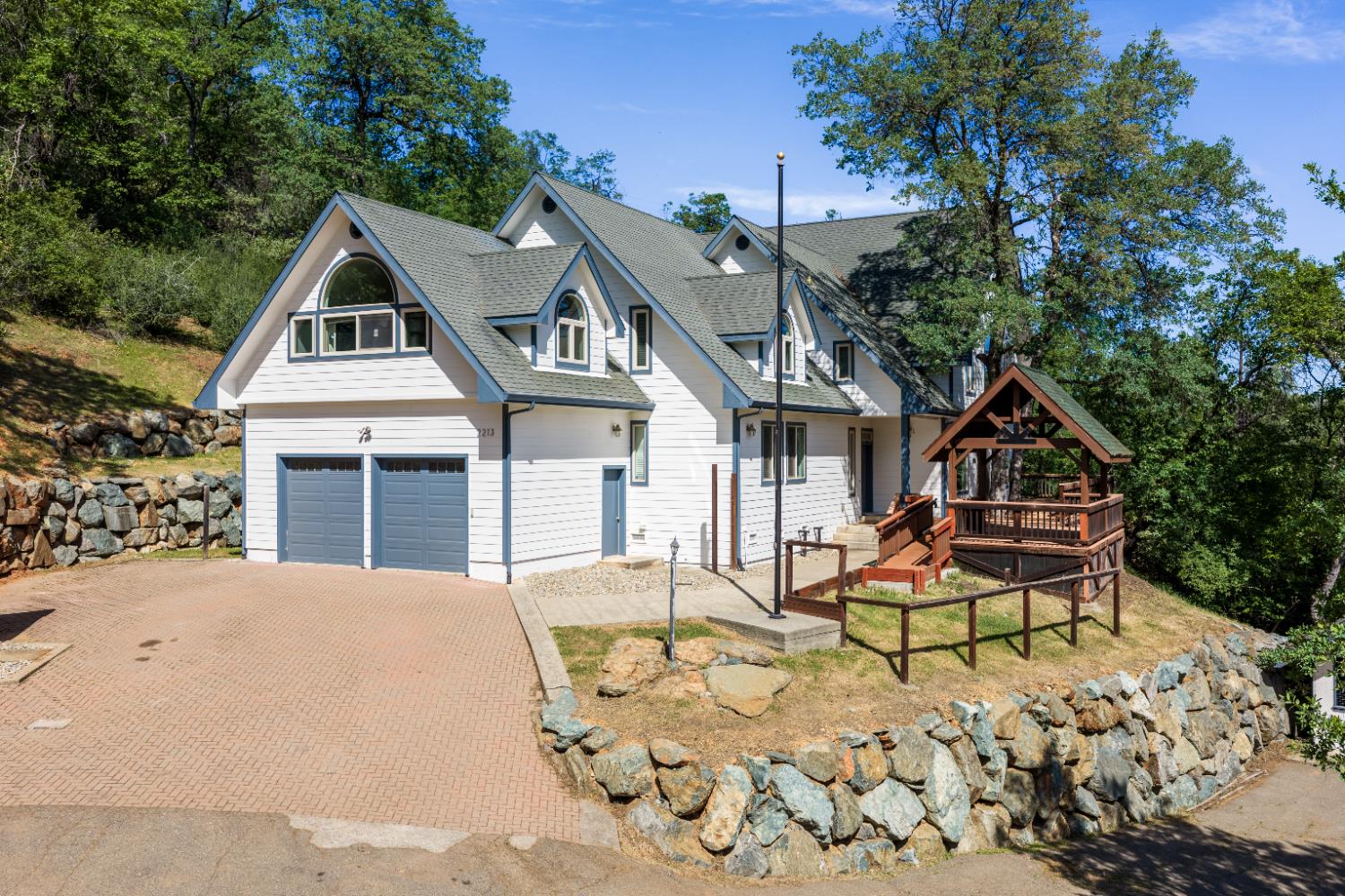2213 Old Toll Road Placerville, CA 95667 - Photo 2 of 77 a house view with a sitting space and garden
