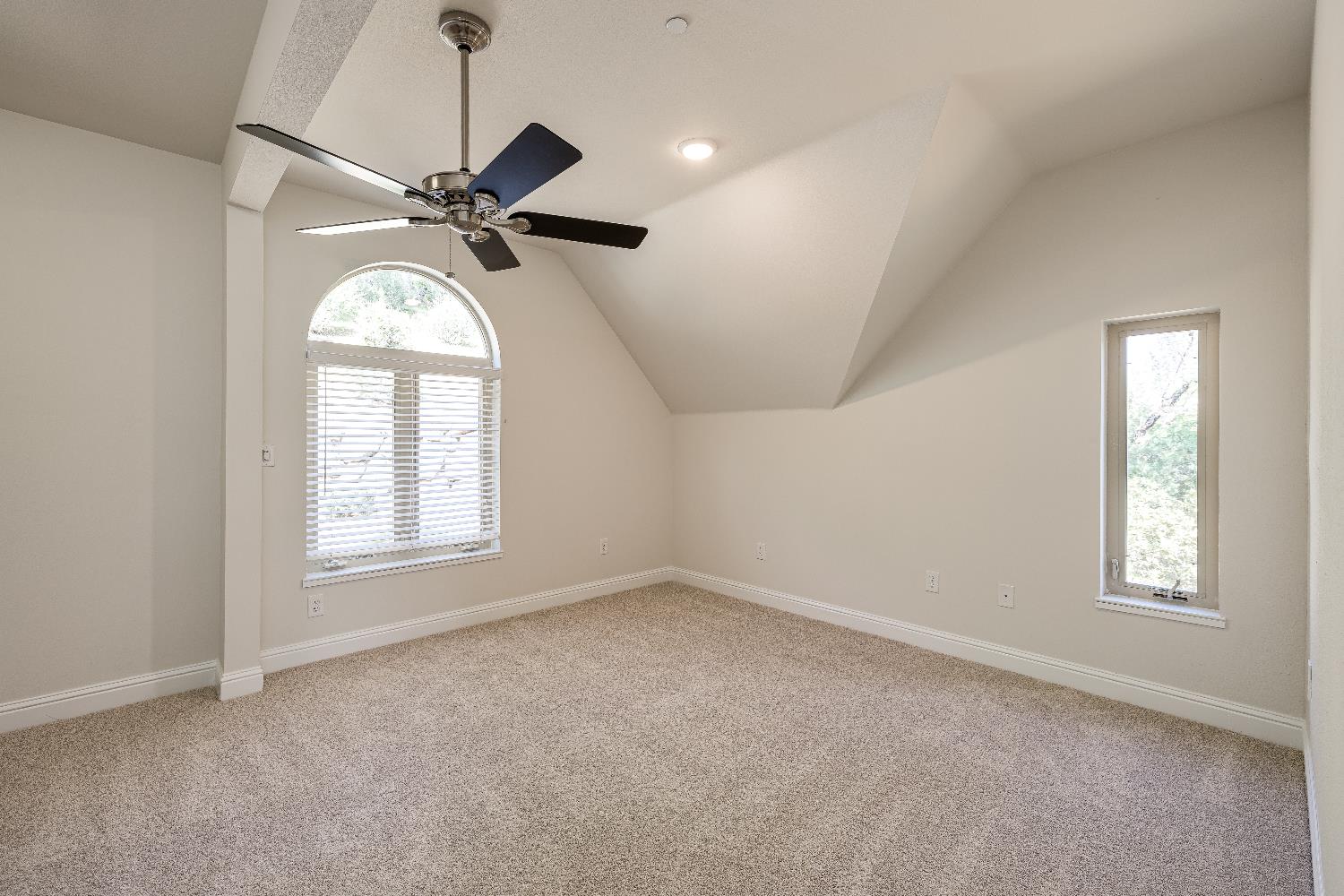 2213 Old Toll Road Placerville, CA 95667 - Photo 38 of 77 an empty room with windows and fan