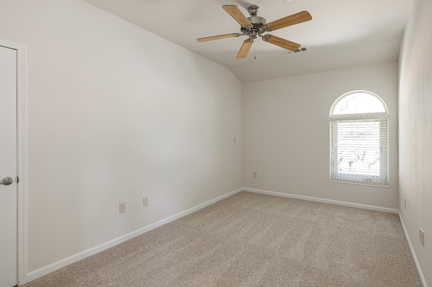 2213 Old Toll Road Placerville, CA 95667 - Photo 41 of 77 an empty room with a window and a fan